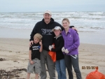 Johnny Rayburg, CCA SA President & kids at Billy Sandifer beach cleanup